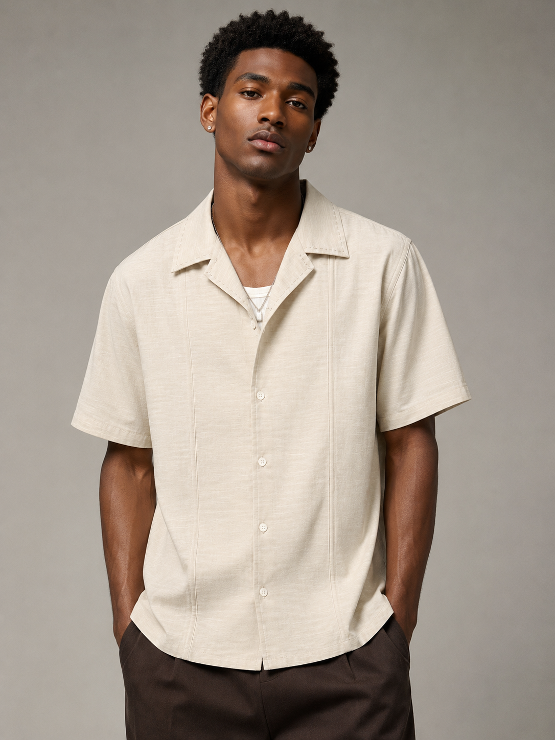 Apricot textured Artisan Stitch short-sleeve shirt styled on a male model