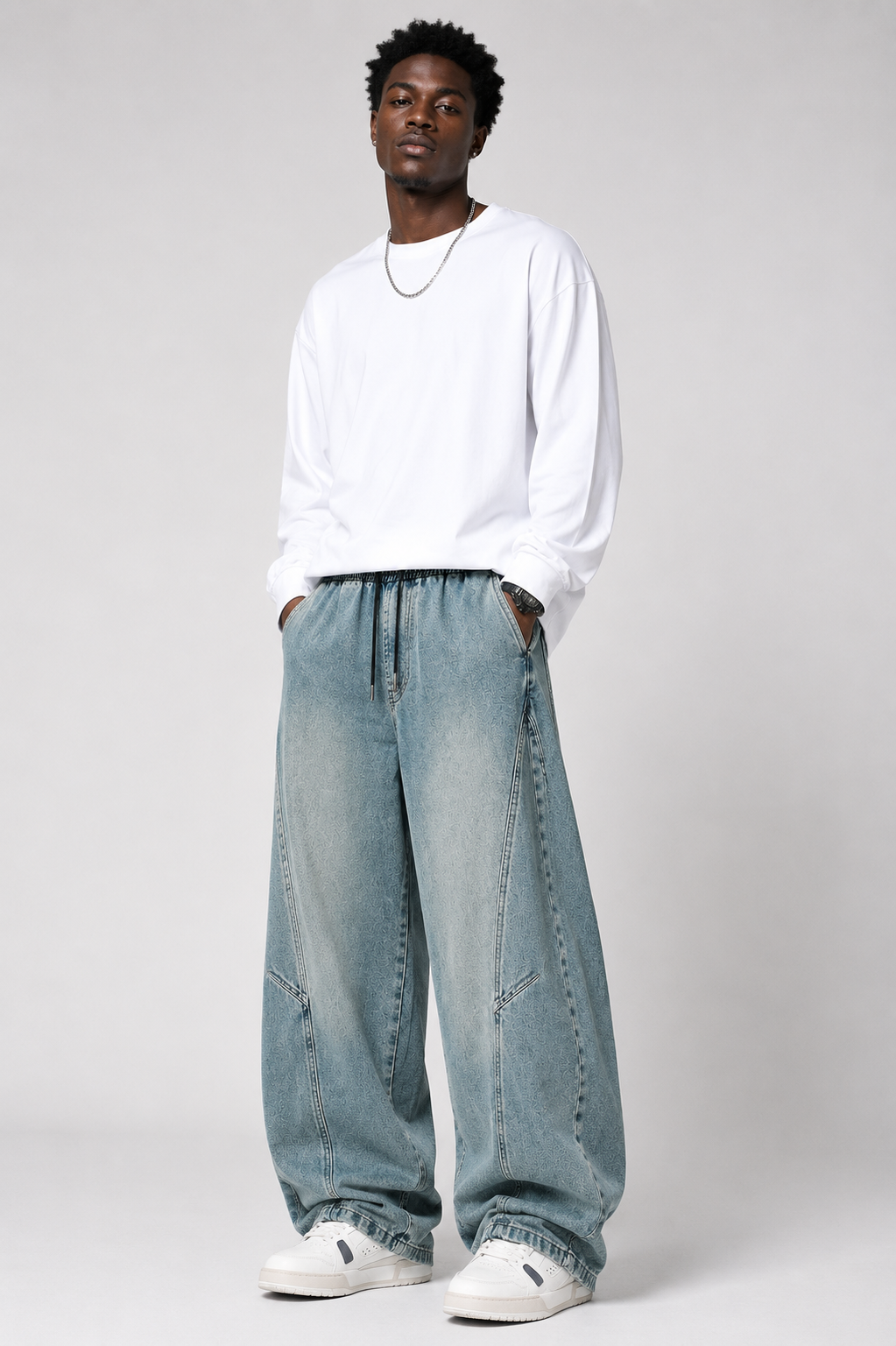 Retro blue Axis Utility Trousers styled on a male model in a studio