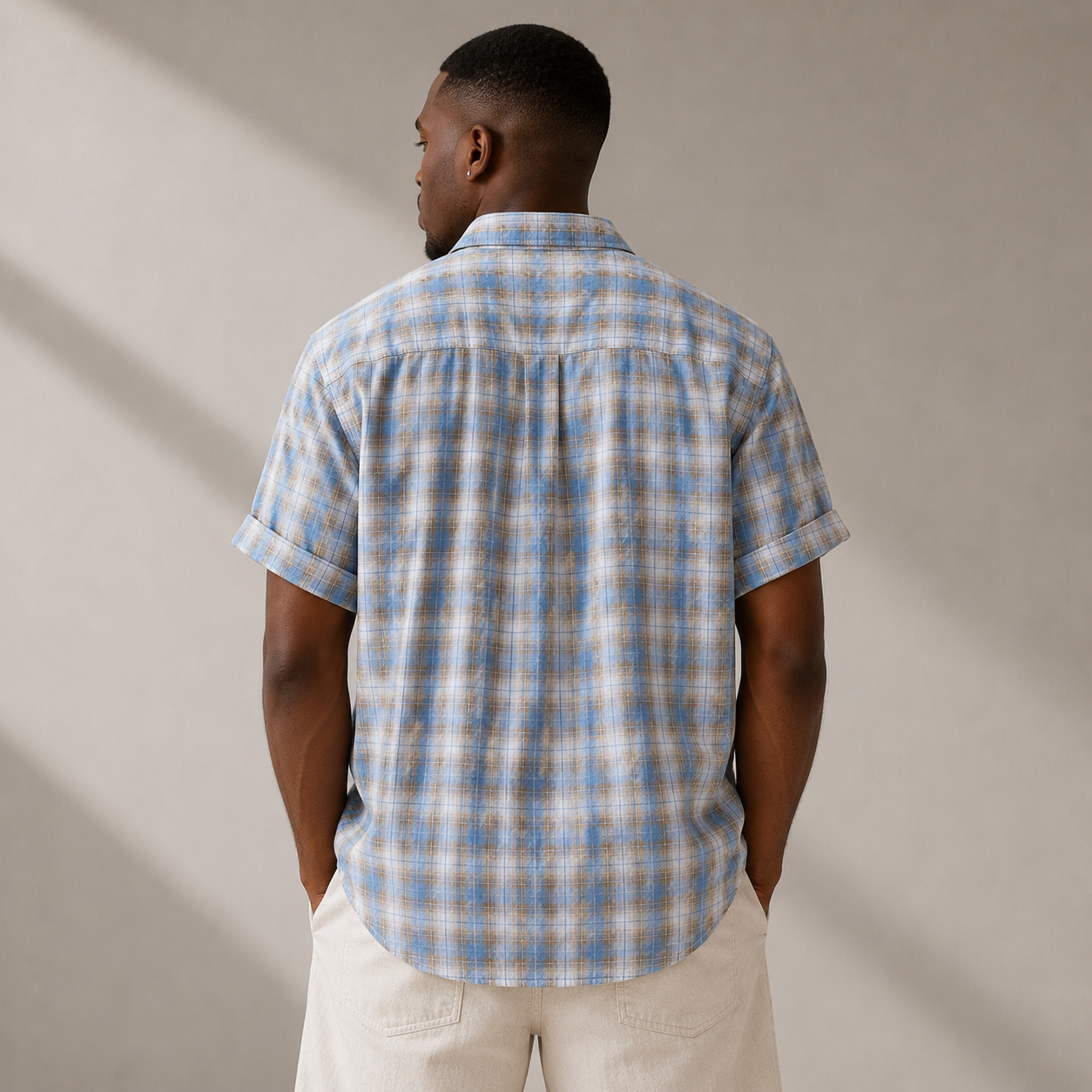 Blue Checkmate Plaid Shirt styled on a male model, back view