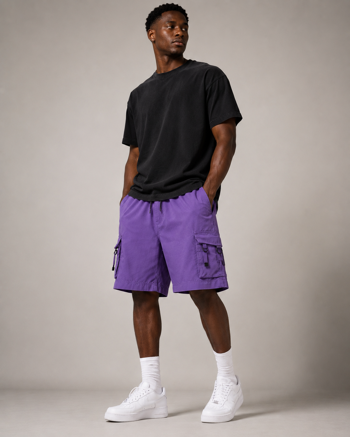 Purple Court Athletic Shorts styled on a male model, front view