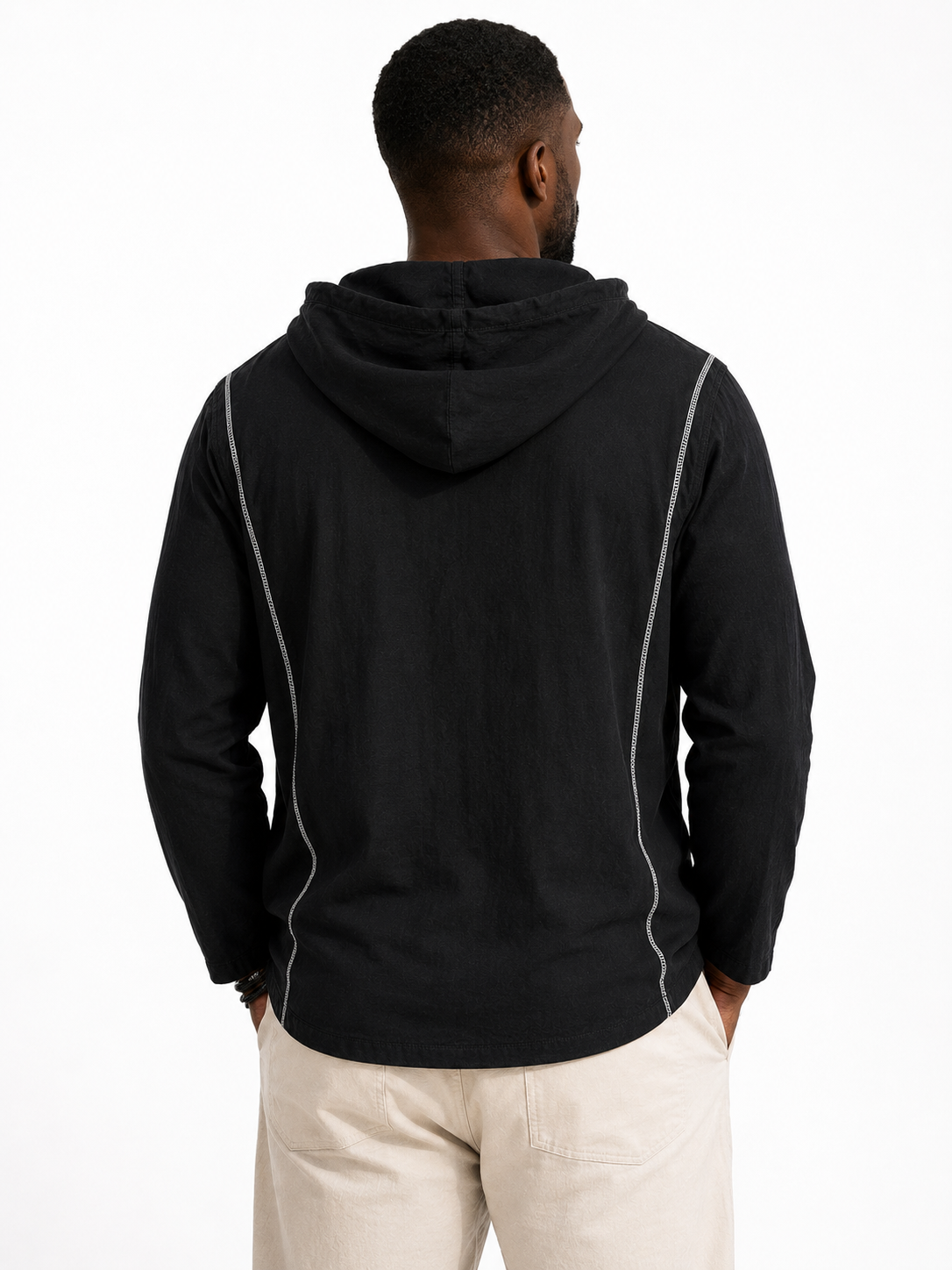 Professional model wearing the Haven hooded sweatshirt in black — back view